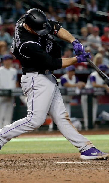 Iannetta drives in 2 in 10th, Rockies sweep D-backs